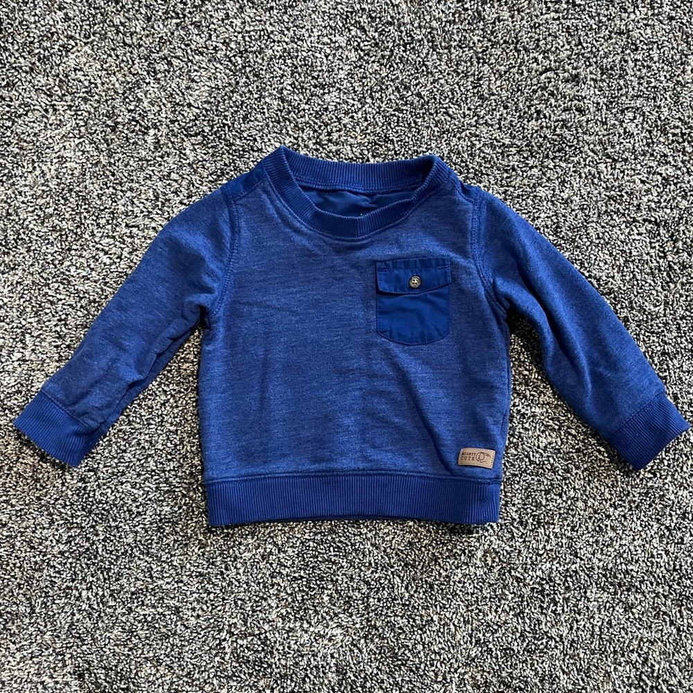 Knit sweater with button